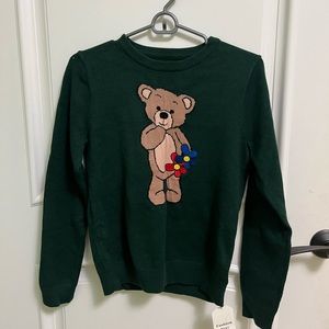 green teddy bear sweater